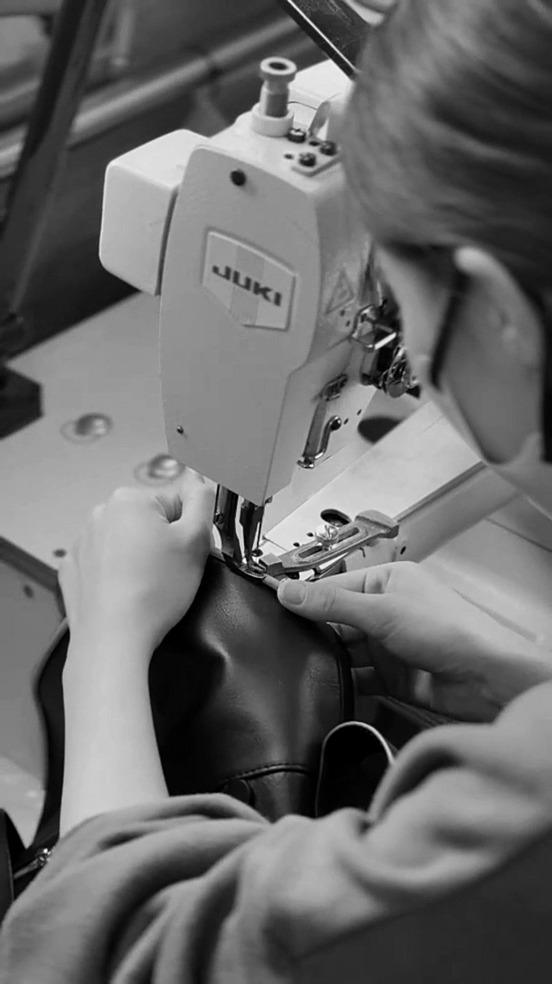 Sewing a leather bag on an industrial sewing machine in kawa-kawa’s own factory in Osaka